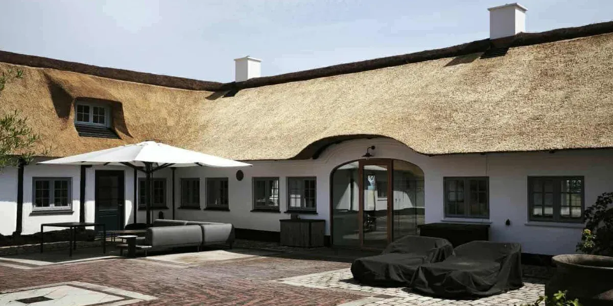 Elegant Reed Thatched Roof House with Courtyard Terrace